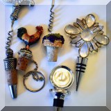 K02. Wine stoppers and corkscrews. 